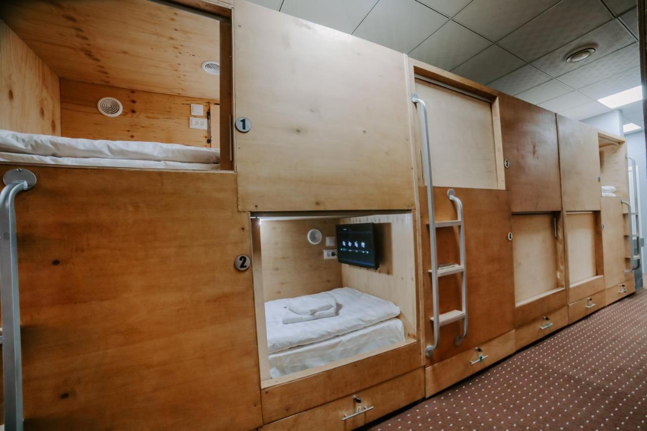 Capsule Hotel Ош Екстериор снимка